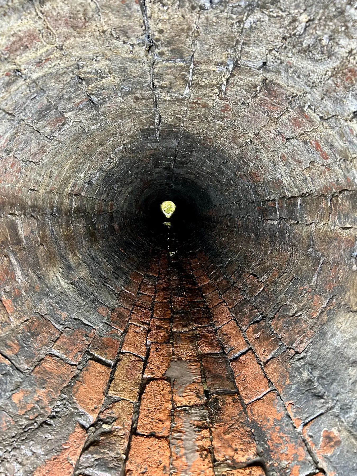 Brick culvert following removal of accumulated silt and debris