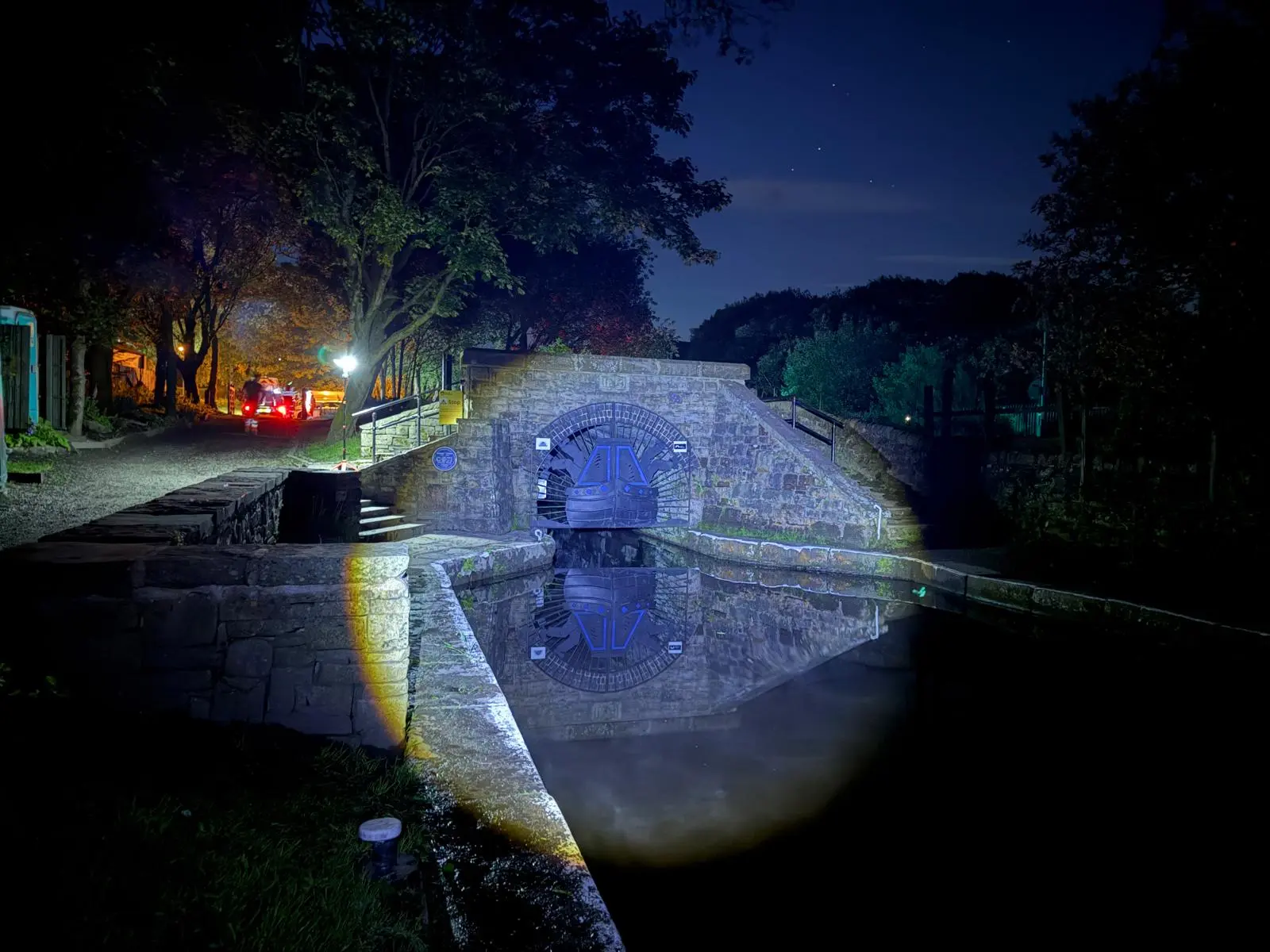 Historic canal structure illuminated during night works