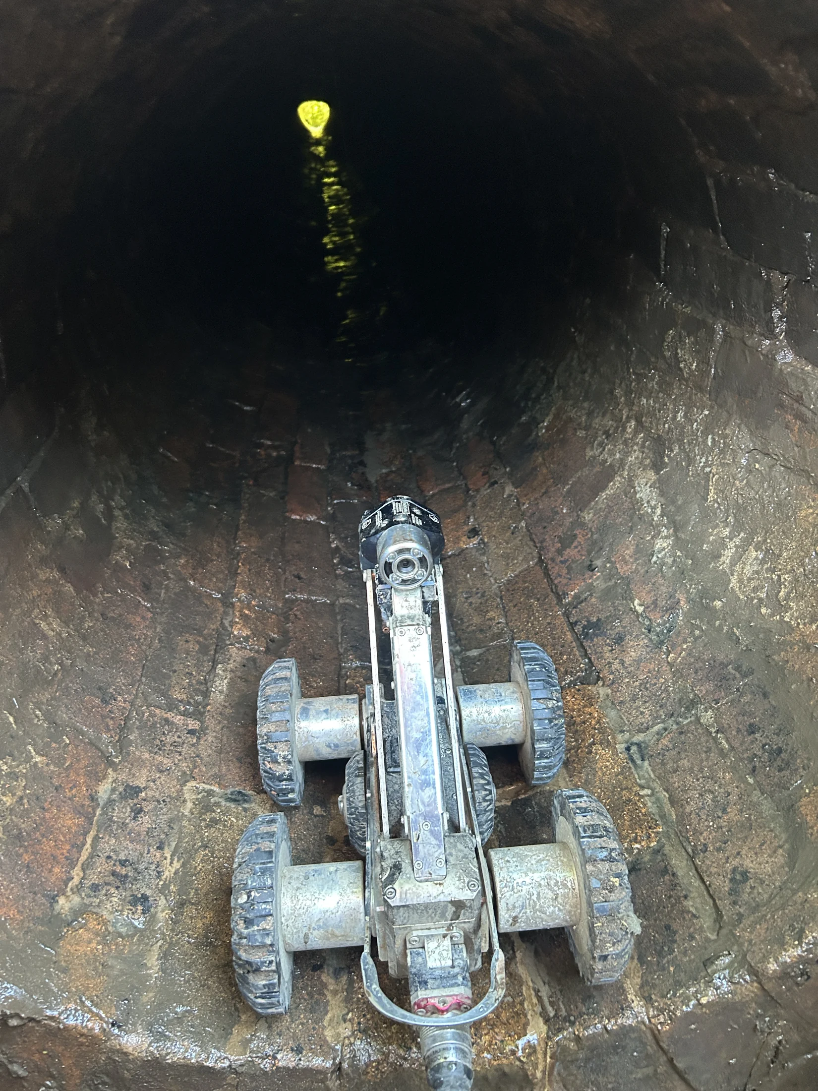 Remote inspection camera deployed inside a masonry culvert